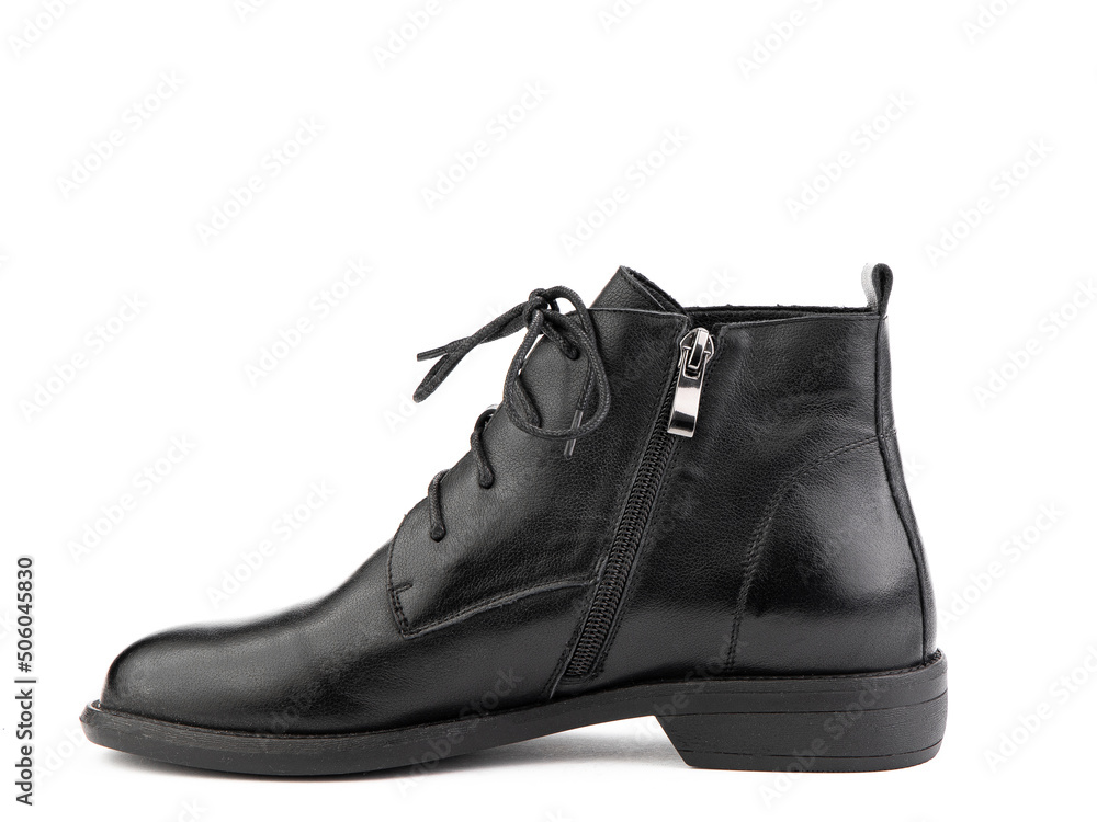 Women's autumn black leather jodhpur boots with laces and average heels, isolated white background. Left side view. Fashion shoes. Women's autumn black leather jodhpur boots with laces and average heels, isolated white background. Left side view. Fashion shoes.
