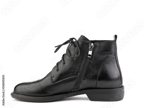 Obraz na płótnie Women's autumn black leather jodhpur boots with laces and average heels, isolated white background. Left side view. Fashion shoes. w salonie