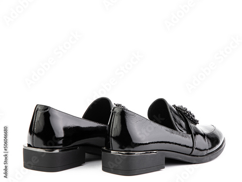 Obraz na płótnie Vintage Women's Loafer Shoes. Closeup. Advertising shot. Leather shoes. Concept closeup shoes. Isolated object close up on white background. Back w salonie