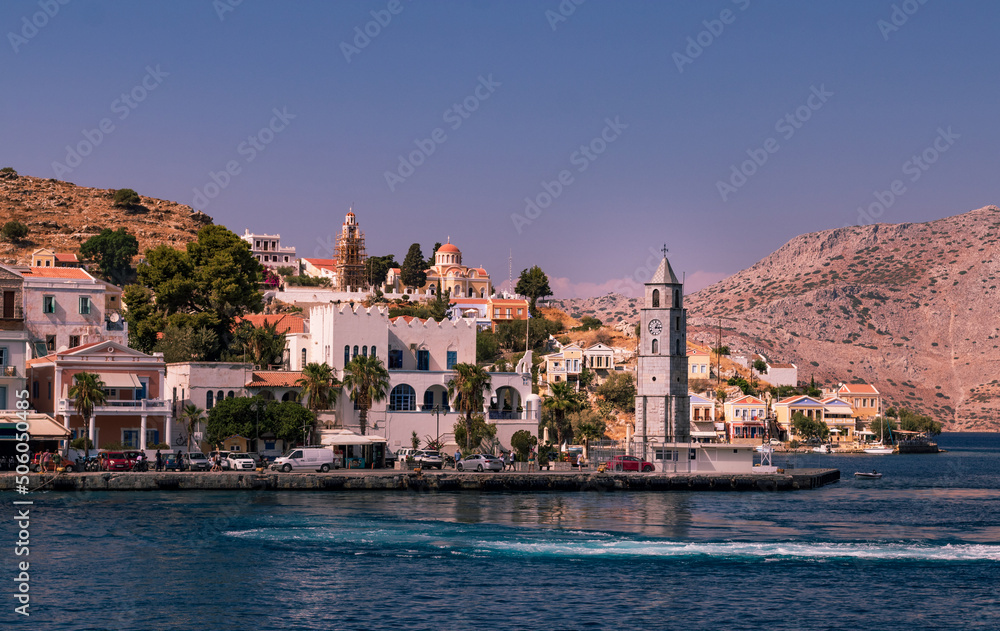 The clock tower on Symi Island seen from the ship