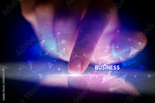 Finger touching tablet with business connection concept