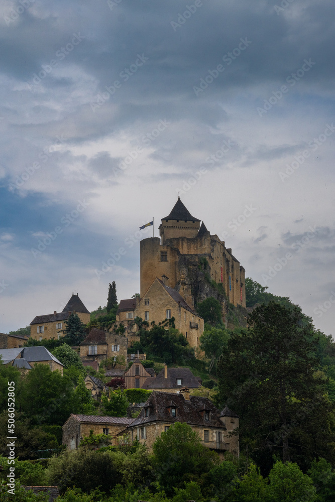 vertical view of the castle in Castelnaud-la-Chapelle in the Dordogne Valley under an overcast sky
