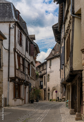 Fototapeta Naklejka Na Ścianę i Meble -  narrow street in the historic fortified town center of Beaulieu-sur-Dordogne