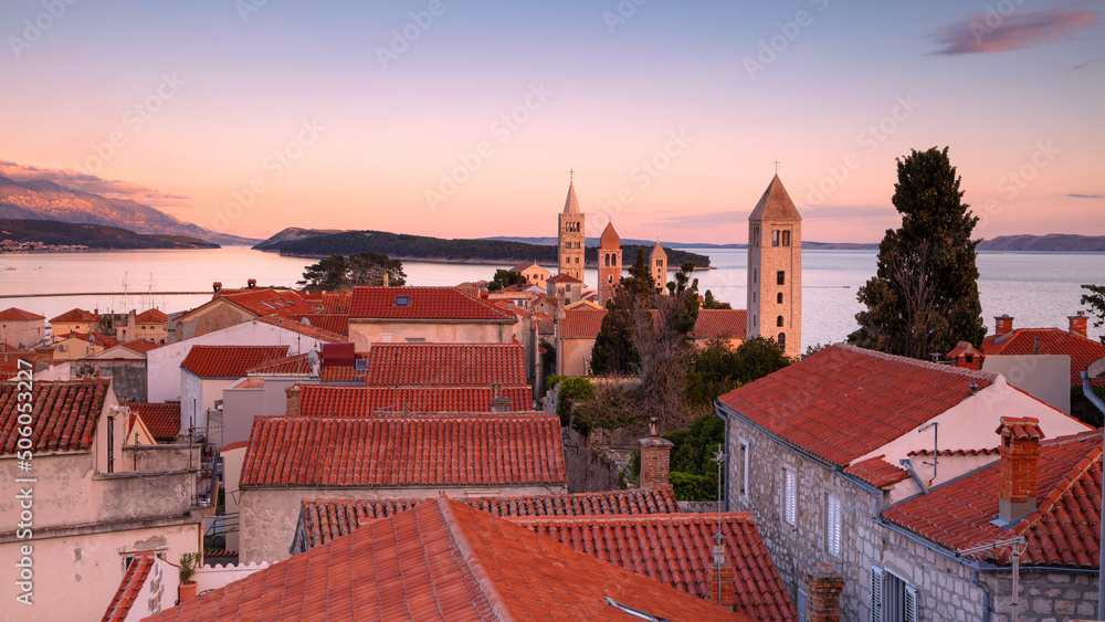 Rab, Rab Island, Croatia. Panoramic cityscape image of iconic village Rab, Croatia located on Rab Island at sunset.