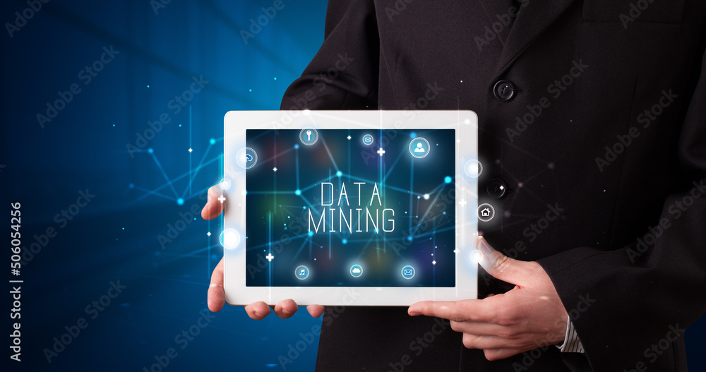 Person holding tablet, security concept Person holding tablet, security concept