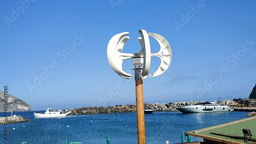 Ischia - Mini pala eolica sulla spiaggia di Sant'Angelo photo
