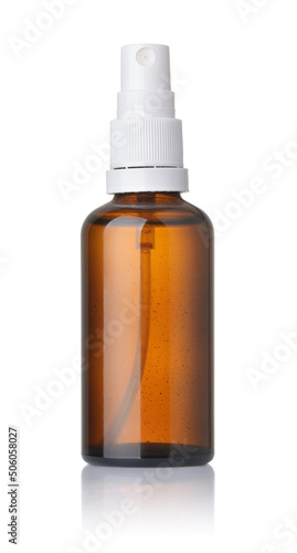 Front view of amber glass medical spray bottle