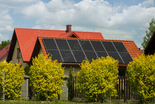 solar panels on roof of house garage renewable energy
