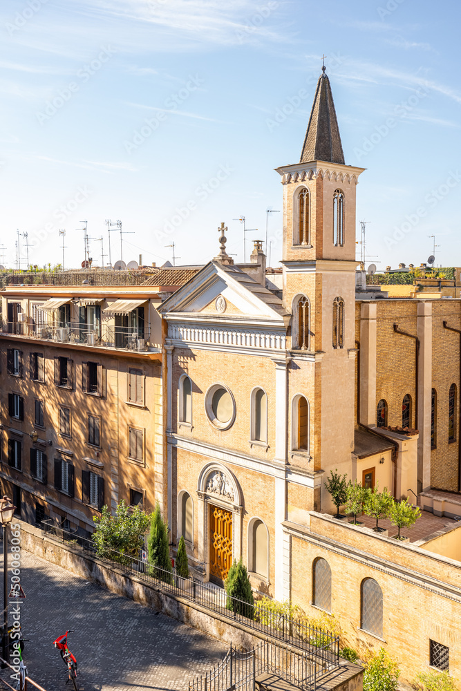 Obraz premium Top View on the street with unknown church at residential district at old town of Rome on a sunny day