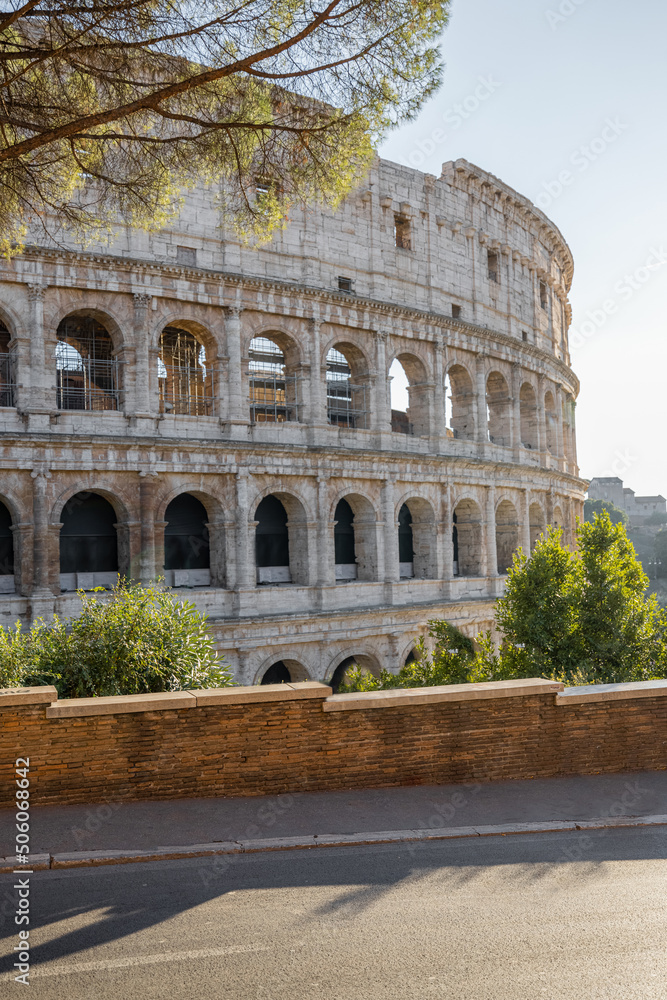 Part view of Colosseum on a sunny day. Traveling Italian landmarks concept