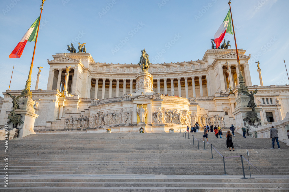 View on Monument of Vittorio Emanuele from square Venezia in Rome. Sunset cityscape with Roman landmarks. Concept of historical landmarks and travel Italy