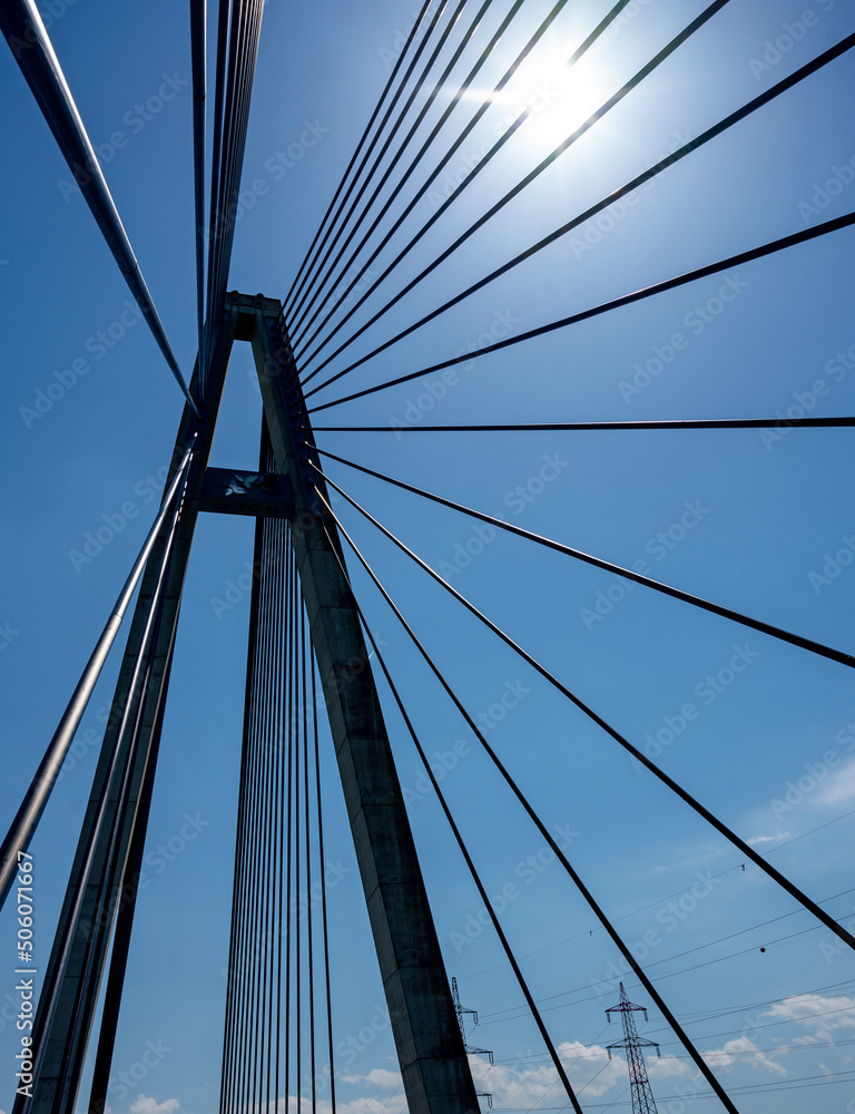 Fototapeta premium Cables and pylon of the modern rose bridge across the river Danube near Tulln, Austria