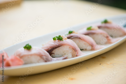 Closed up japanese sushi Maki in dish show food background