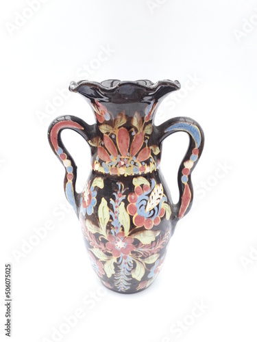 Folk art ceramic vase with colorful flowers