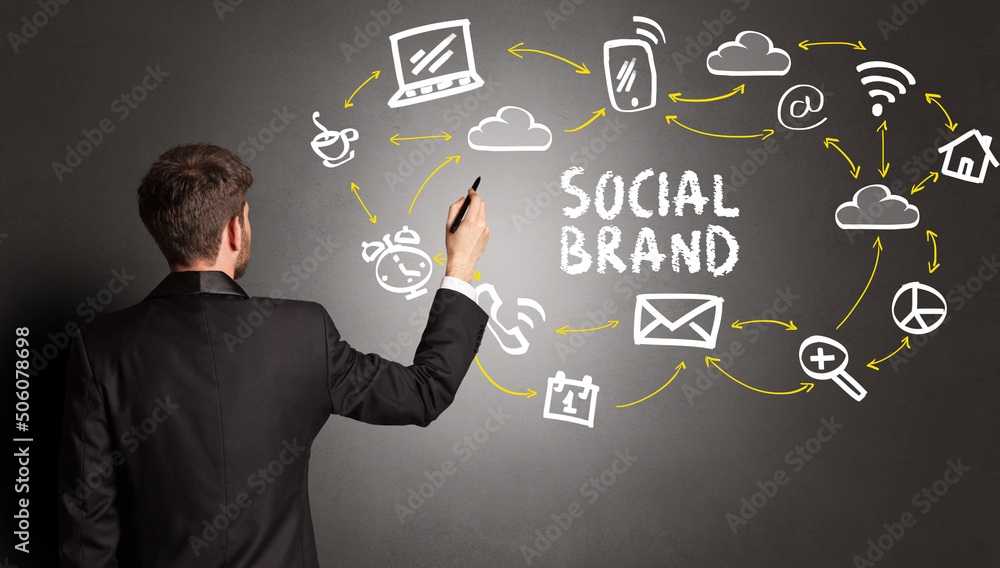 businessman drawing social media icons businessman drawing social media icons