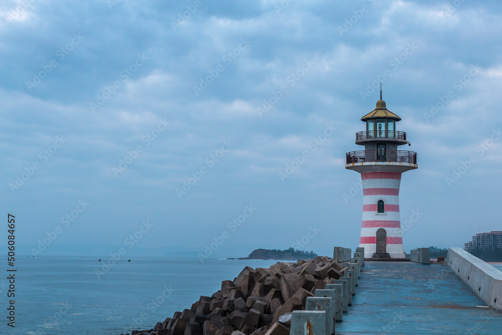 lighthouse beside sea