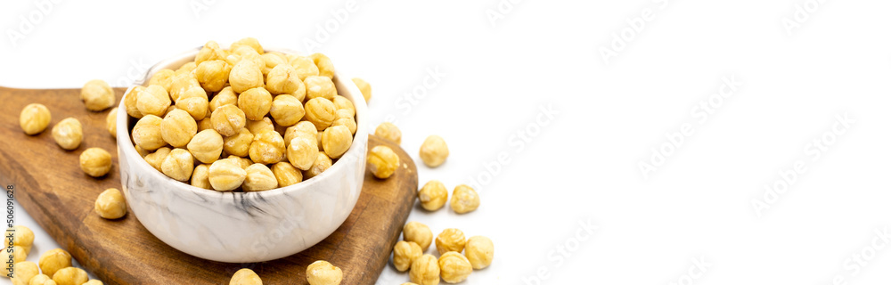 Roasted hazelnut nut isolated on white background. Organic nuts. Copy space. Space for text. close up Roasted hazelnut nut isolated on white background. Organic nuts. Copy space. Space for text. close up