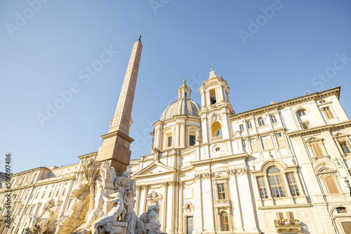 View on the fountain of Four Rivers and palace on Navona square in Rome on a sunny day © rh2010