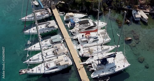 Top view of beautiful yachts in the marina filmed from the air 