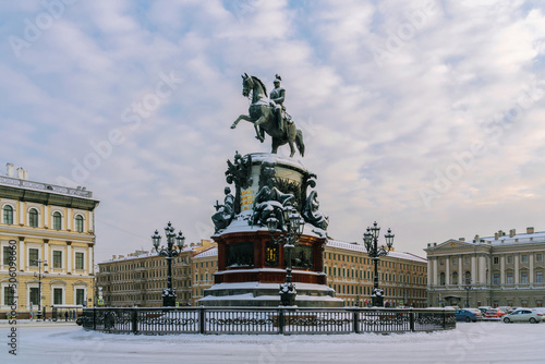 View of the St. Isaac's Square, monument to Emperor Nicholas I and the Mariinsky Palace on a sunny winter day, St. Petersburg, Russia. The inscription 