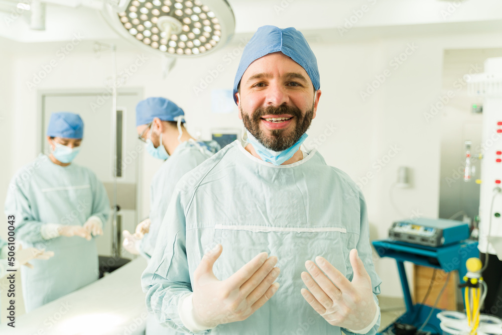 Happy latin surgeon in the operating room Happy latin surgeon in the operating room