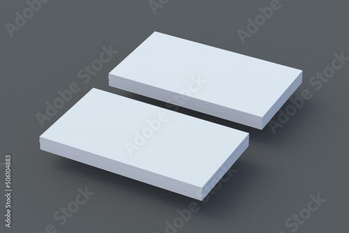 Two stack of blank business cards on gray background. 3d render