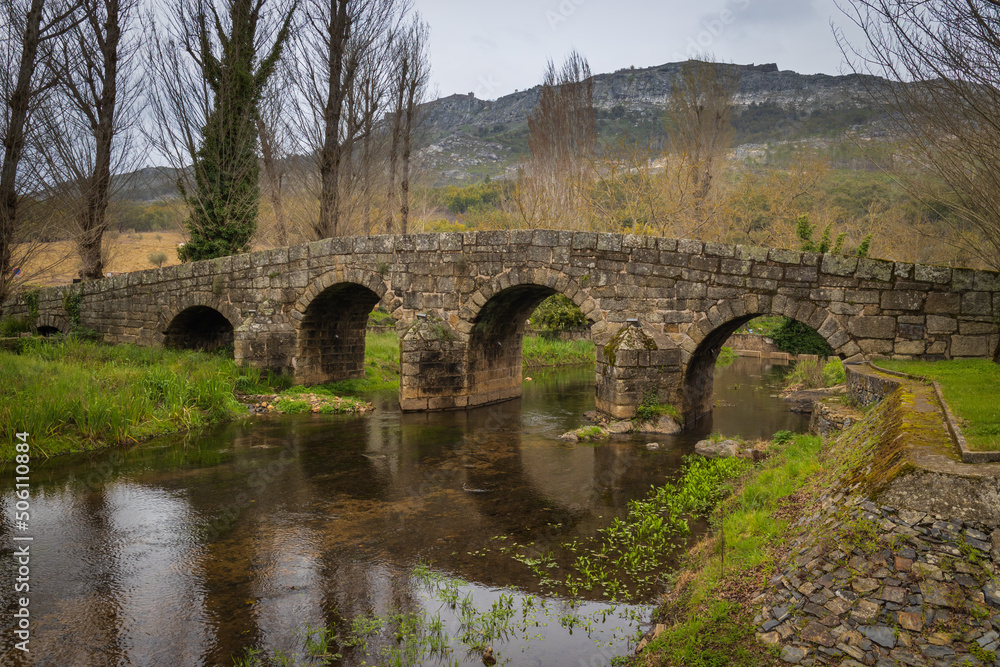 Old roman stone bridge over Sever river in Portagem - Marvão, Portugal