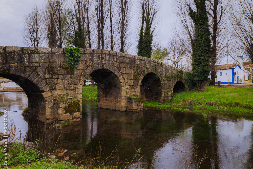 Old roman stone bridge over Sever river in Portagem - Marvão, Portugal