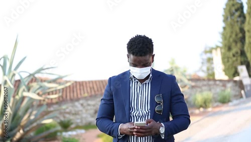 Portrait of young ethnic male manager