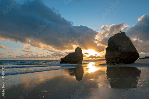 Natural rocks at praia Tres Irmaos in Alvor the Algarve Portugal at sunset