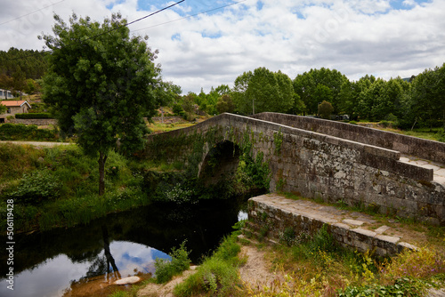 Mondim de Basto (Portugal), May 16, 2022. Cabril River Bridge. Medieval town, it was crossed by the armies of Rome and Napoleon. It is part of the Camino de Santiago. photo