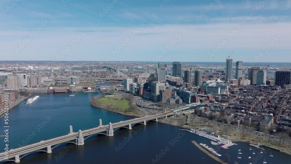 Aerial panoramic view of Longfellow Bridge over Charles river, busy multilane road on waterfront and high rise buildings protruding above other development. Boston, USA Aerial panoramic view of Longfellow Bridge over Charles river, busy multilane road on waterfront and high rise buildings protruding above other development. Boston, USA
