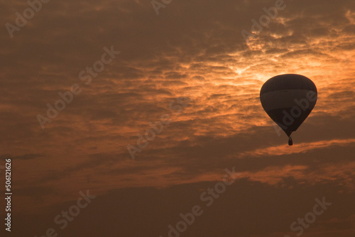 hot air balloon and sunrise photo