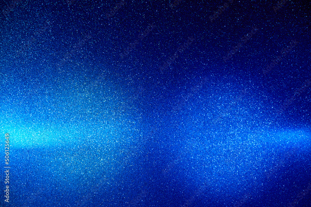 On a gradient blue background in a fine grain of a cloud of light blue light On a gradient blue background in a fine grain of a cloud of light blue light