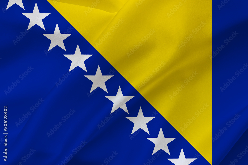 Flag of Bosnia and Herzegovina on waving silk background. Fabric texture. Flag of Bosnia and Herzegovina on waving silk background. Fabric texture.