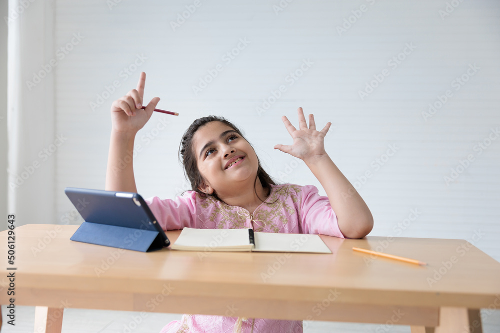 cute Indian girl finger counting gesture and online learning class, education concept cute Indian girl finger counting gesture and online learning class, education concept