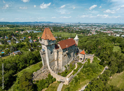 Austria - Liechtenstein Castle from the sky. The Liechtenstein Castle, situated on the southern edge of the Vienna.  Amazing view about a medieval castle photo