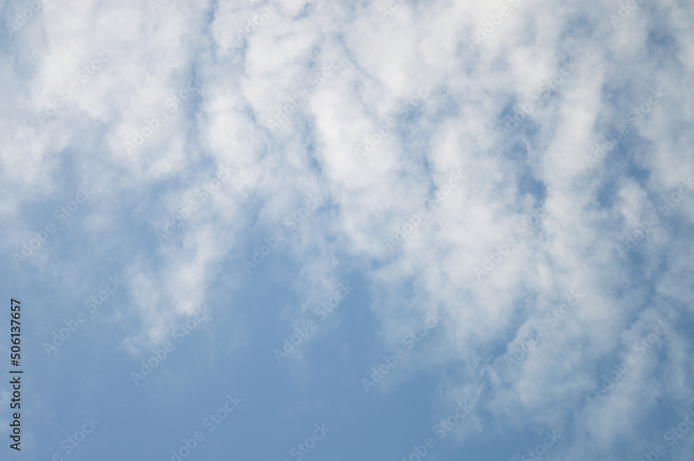 Obraz premium Blue sky with a fragment of chemical trail