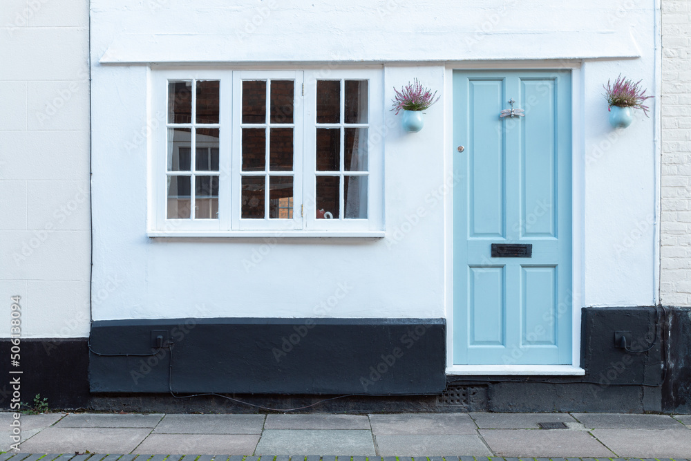 Home entrance with retro blue door. Home entrance with retro blue door.