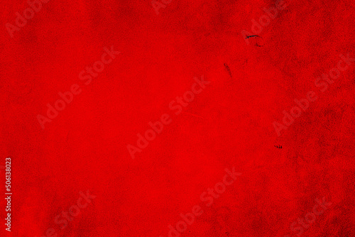 Red matte background of suede. Velvet texture of seamless leather. Red suede texture.