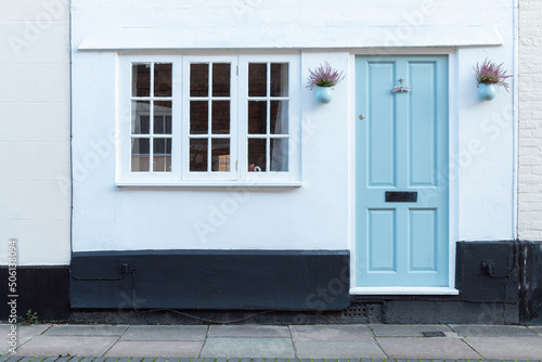 Home entrance with retro blue door.