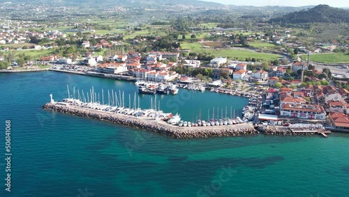 Various drone shots in beautiful Urla, Izmir - the third largest city in Turkey. Blue waters of the Aegean Sea, seagulls and sailboats on a sunny summer morning/afternoon. photo