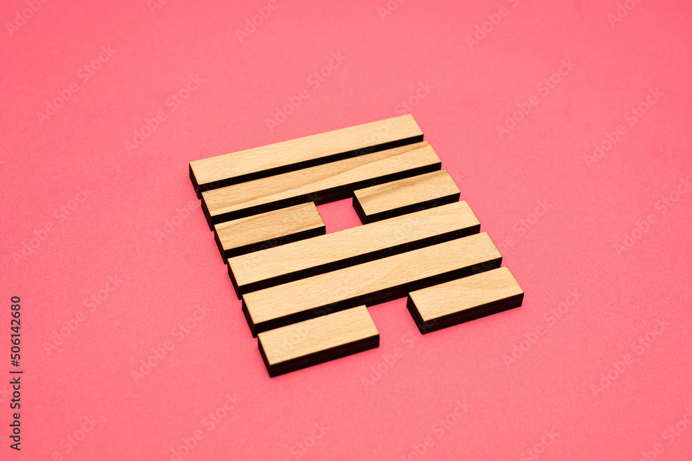 Gene Key 57 wood hexagram i ching on pink background Gene Key 57 wood hexagram i ching on pink background