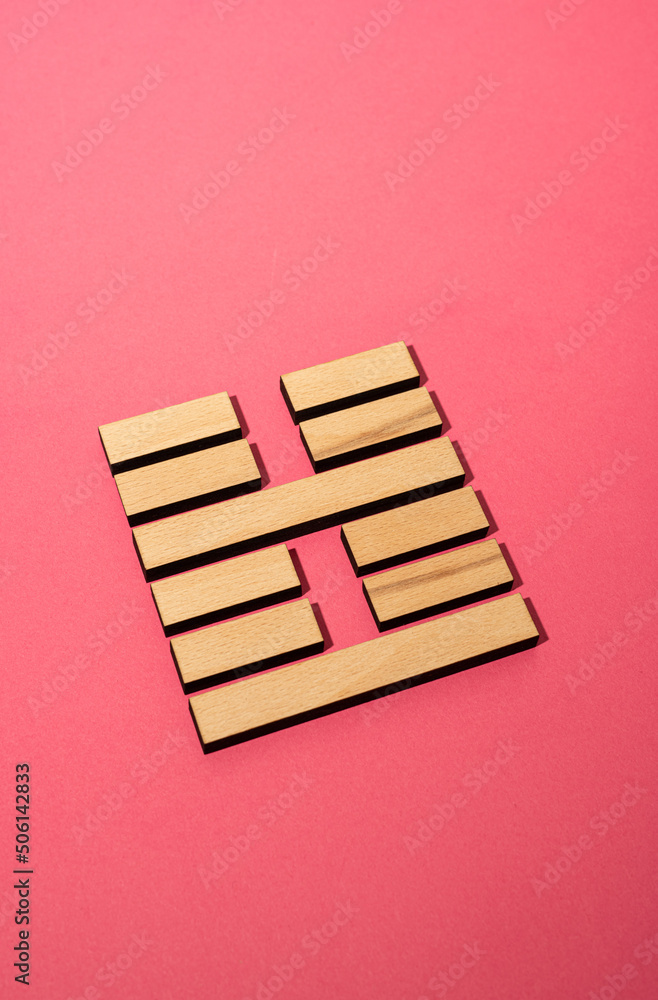 Gene Key 51 wood hexagram i ching on pink background Gene Key 51 wood hexagram i ching on pink background