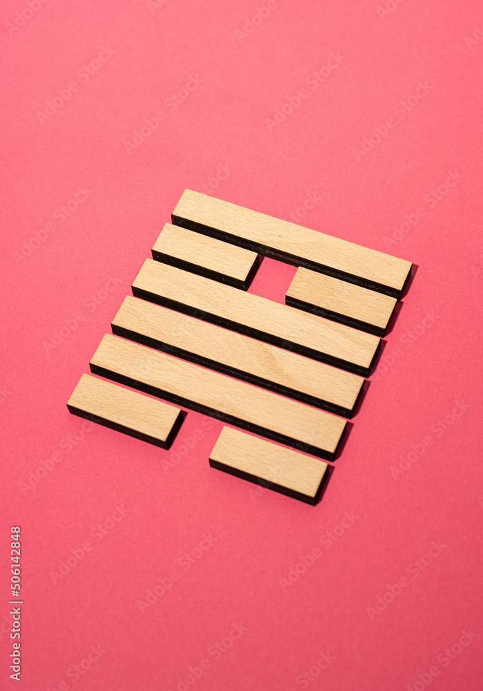 Gene Key 50 wood hexagram i ching on pink background Gene Key 50 wood hexagram i ching on pink background