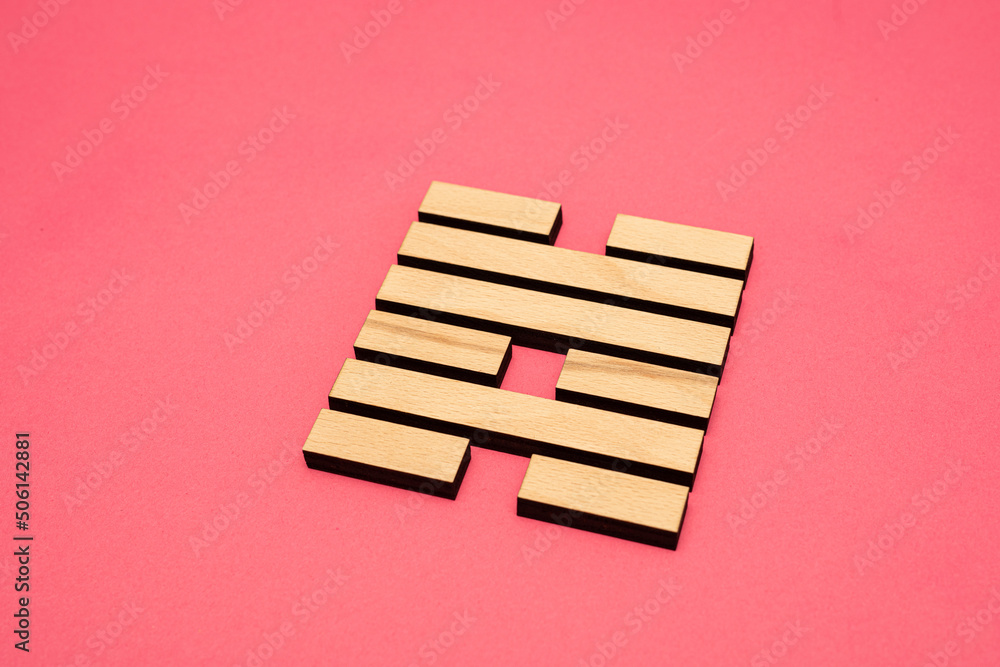 Gene Key 47 wood hexagram i ching on pink background Gene Key 47 wood hexagram i ching on pink background