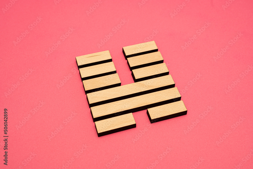 Gene Key 46 wood hexagram i ching on pink background Gene Key 46 wood hexagram i ching on pink background