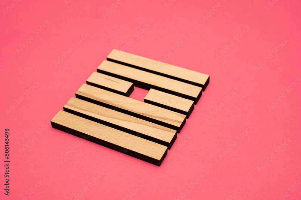 Gene Key 9 Hexagram wood i ching on pink background Gene Key 9 Hexagram wood i ching on pink background