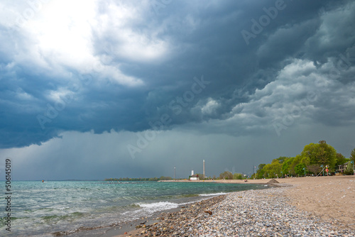 Canvas Print A storm cell moves over a beach on Lake Ontario