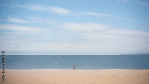 lonely man on a beach